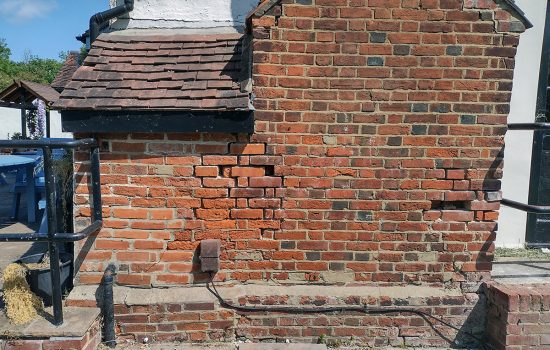 We established a control network to monitor ground movement around the popular pub over the course of several months.